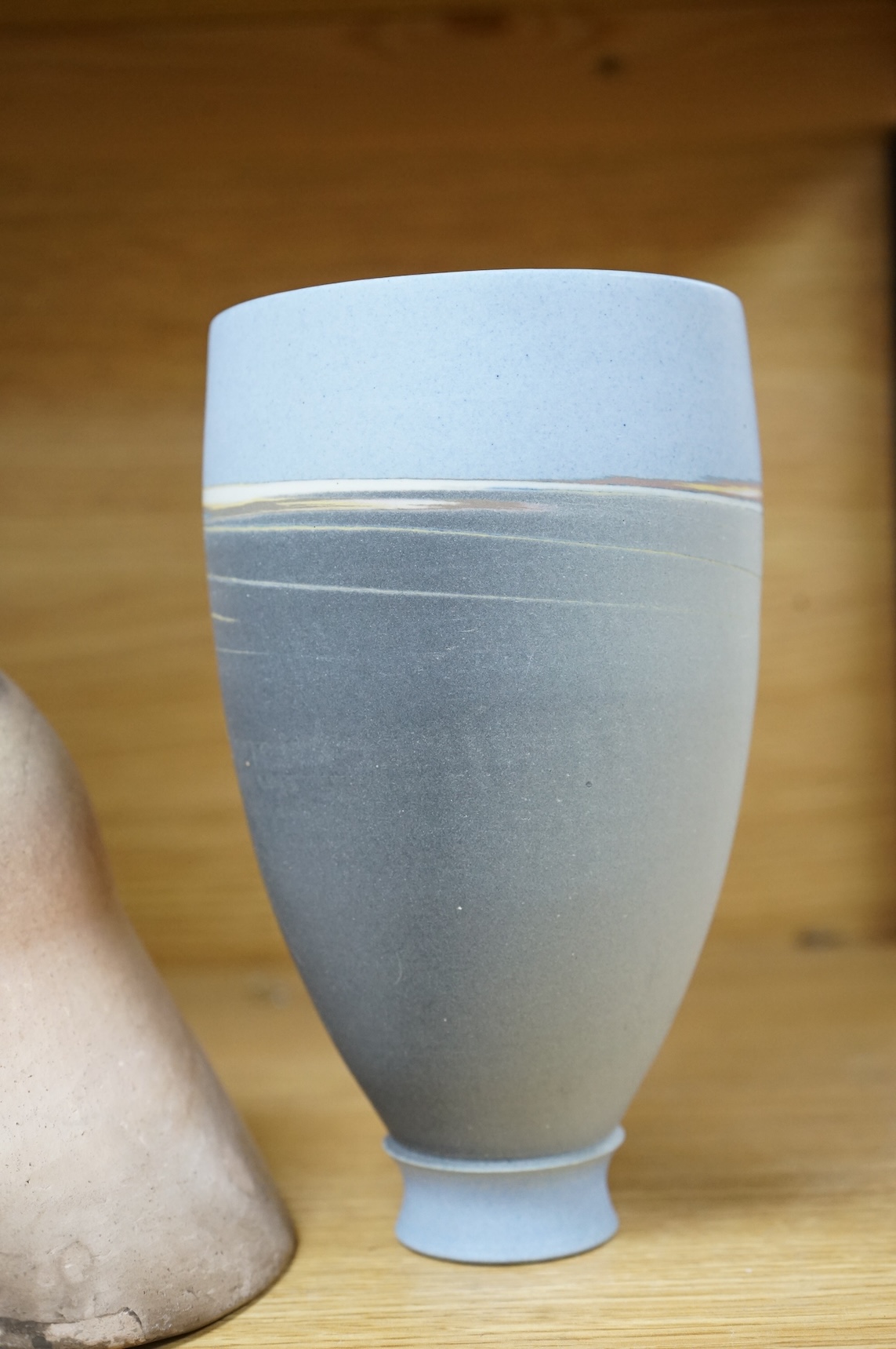 A studio pottery with incised initialled, dated ‘73 and a similar bowl, largest 21cm in diameter